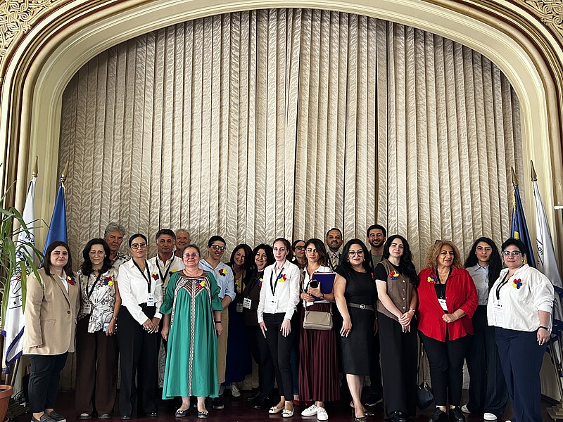 Participants in the training course in Bucharest pose for a group photo